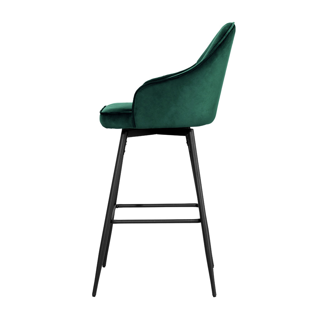 Stylish green velvet bar stool with metal legs, perfect for kitchen counters and modern home bar setups.