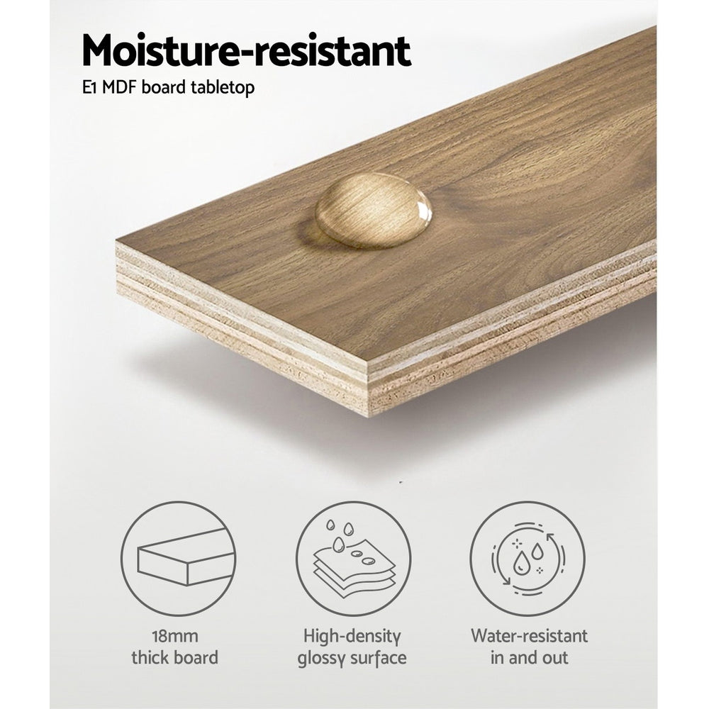 Moisture-resistant E1 MDF tabletop showcasing water bead on high-density glossy surface, emphasizing durability and quality.