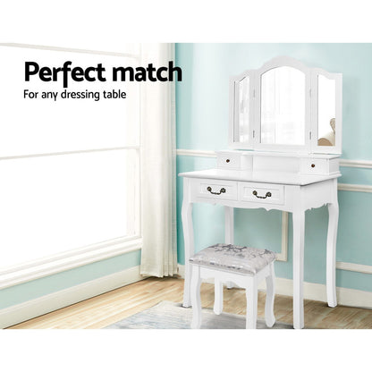 Stylish white dressing table with matching velvet stool, perfect for any vanity setup and enhancing bedroom elegance.