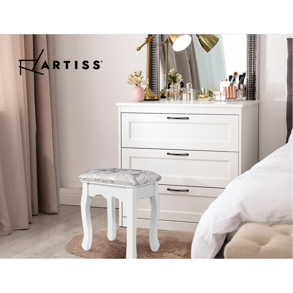 Artiss dressing table stool in velvet white beside a stylish vanity in a beautifully decorated bedroom setting.