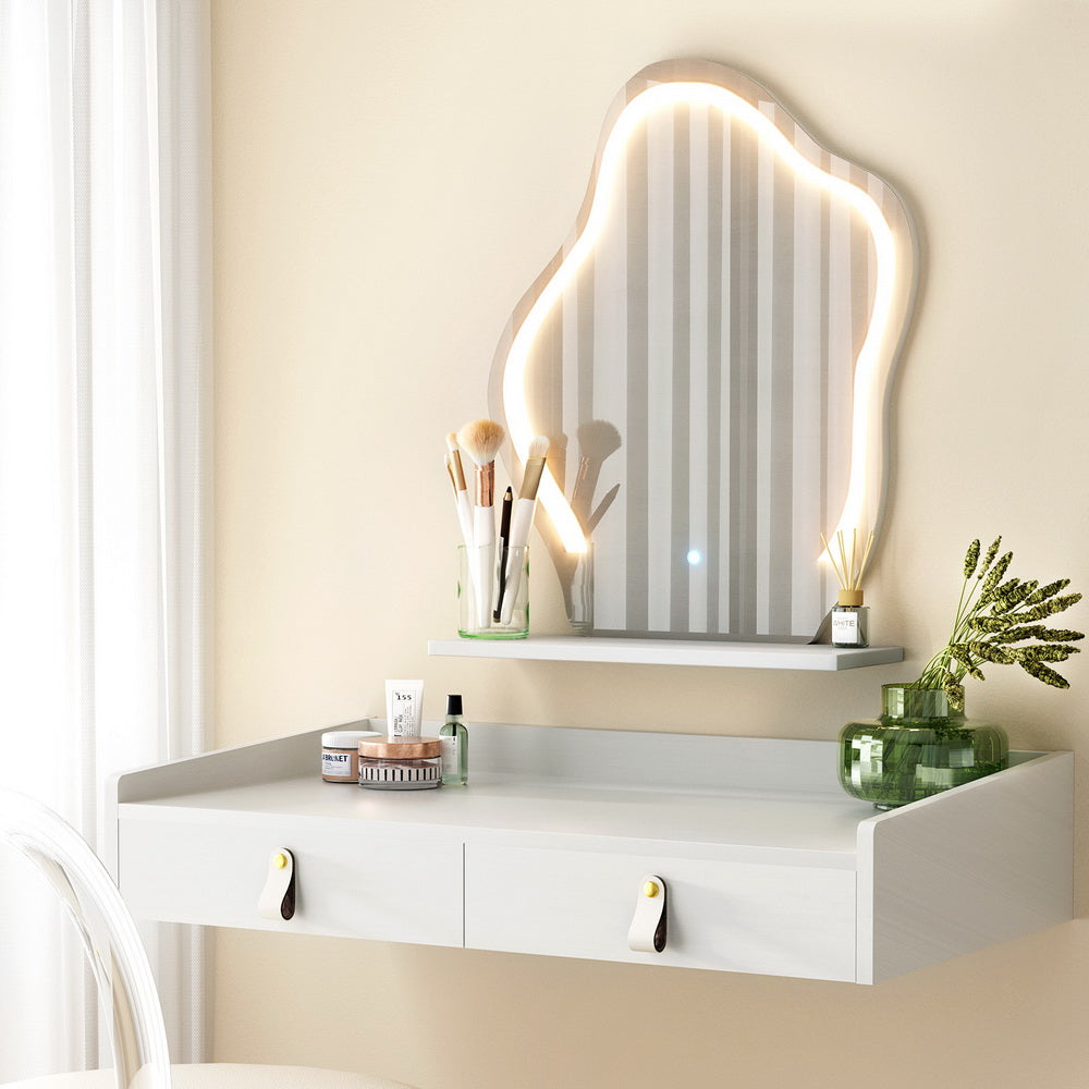 Artiss Floating LED White Daphne Dressing Table with stylish cloud-shaped mirror and makeup essentials on a sleek wall-mounted design.