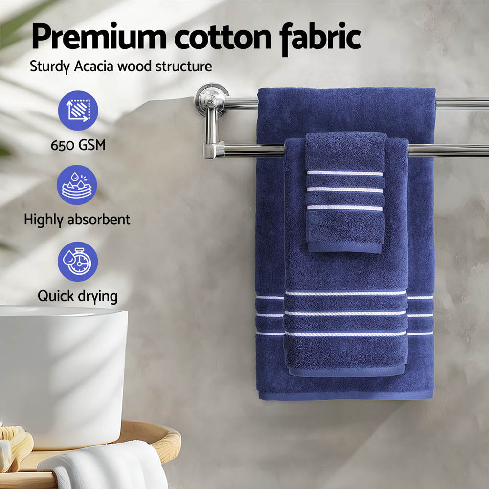 Premium navy cotton bath towels set showcasing high absorbency and quick drying features, displayed on an Acacia wood rack.