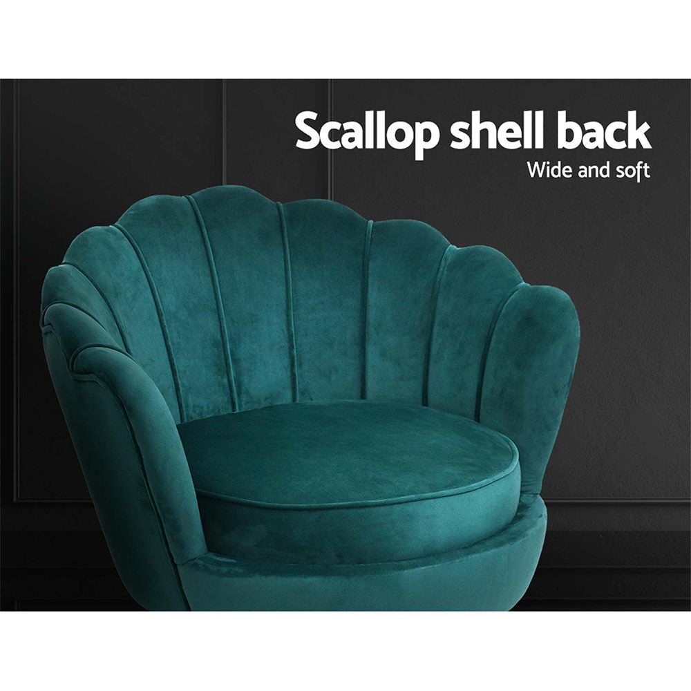 Elegant green velvet accent chair with scallop shell back, offering a luxurious and comfortable design for any space.