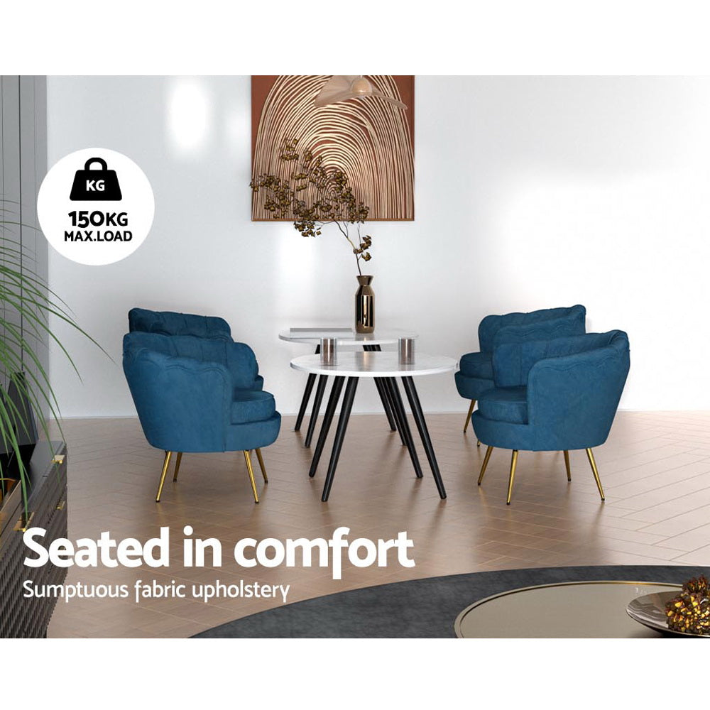 Artiss blue velvet accent chairs in a modern living space, featuring sumptuous upholstery and a stylish round table.