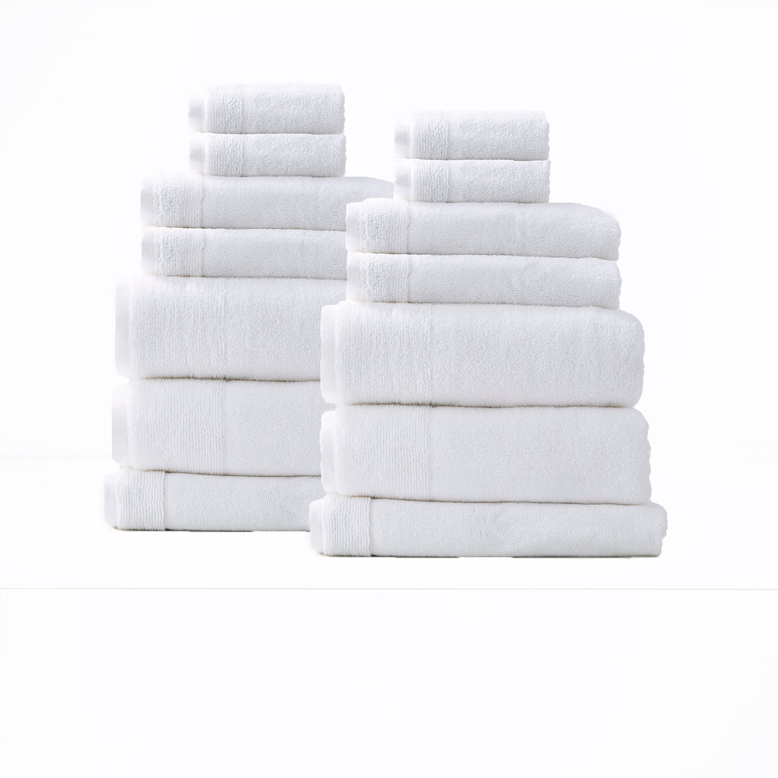 Luxurious snow-colored 14 piece bath towel set by Renee Taylor, crafted from 650 GSM zero twist cotton for soft, quick-drying bathroom towels.