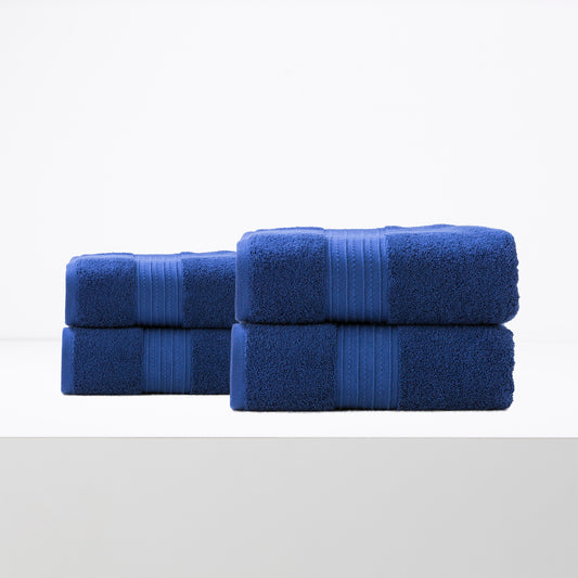 Royal blue bath towel set, 4 pack, 650 GSM low twist combed cotton, luxury towels for bathroom by Renee Taylor.