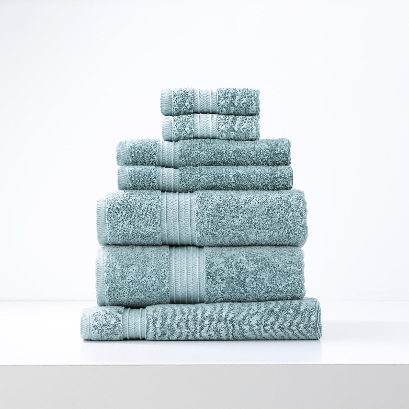 Brentwood 7-piece luxury bath sheet set in mist blue, 650 GSM low-twist cotton, by Renee Taylor. Soft, absorbent bathroom towels.