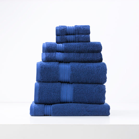 Royal blue Brentwood 650 GSM low-twist 7 piece luxury bath towels by Renee Taylor, soft combed cotton for bathroom elegance.