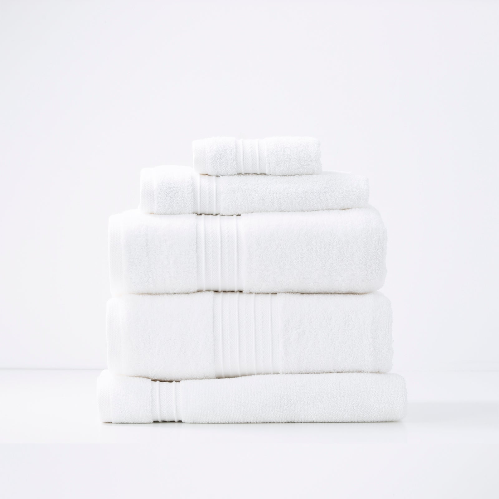 Bright white bath towels, luxury 5-piece set by Renee Taylor, 650 GSM, low twist combed cotton for softness and quick drying.