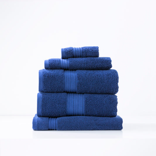 Blue luxury bath towels stack, 5-piece set, Renee Taylor Brentwood, 650 GSM low twist cotton, royal color, soft premium bathroom towels.