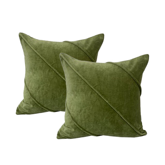 Elegant green velvet cushions twin pack with stylish diagonal design for couch or bed decor.