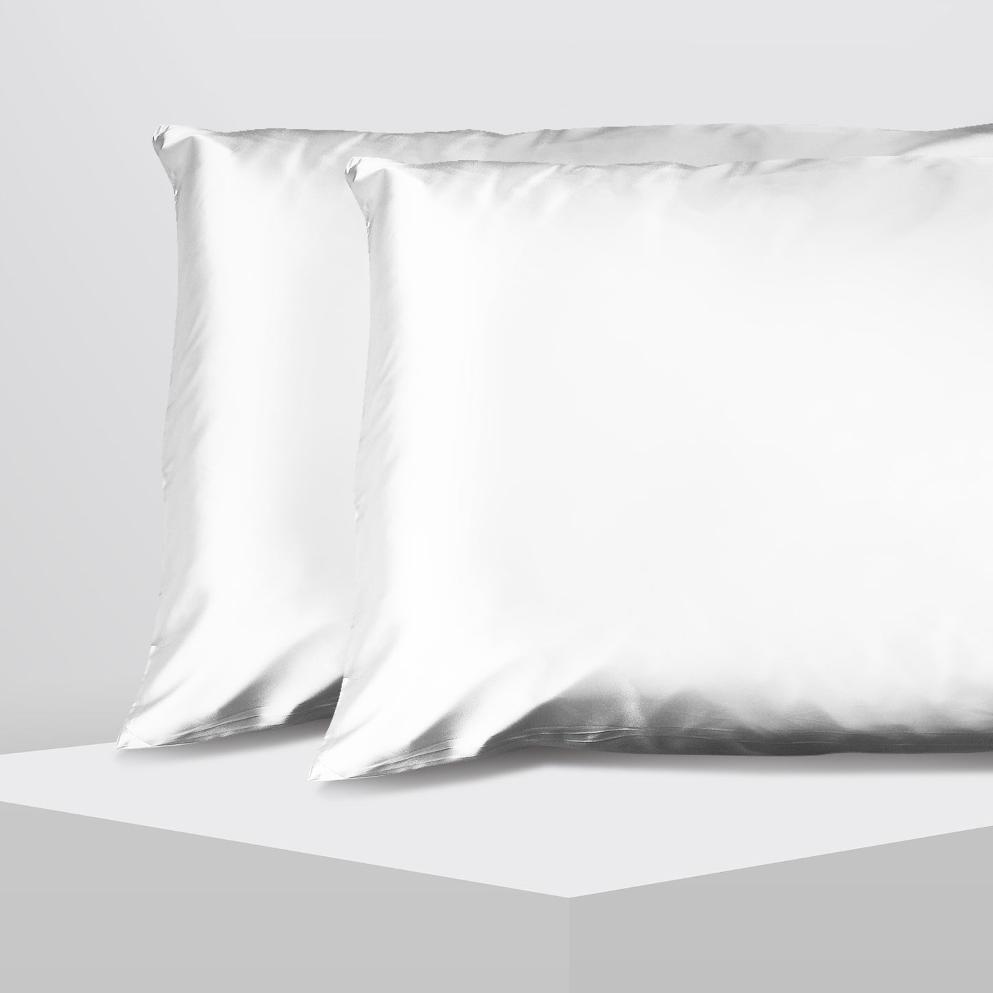 Casa Decor luxury satin pillowcase twin pack in white for smooth and stylish bedding. Perfect for a luxurious sleep experience.