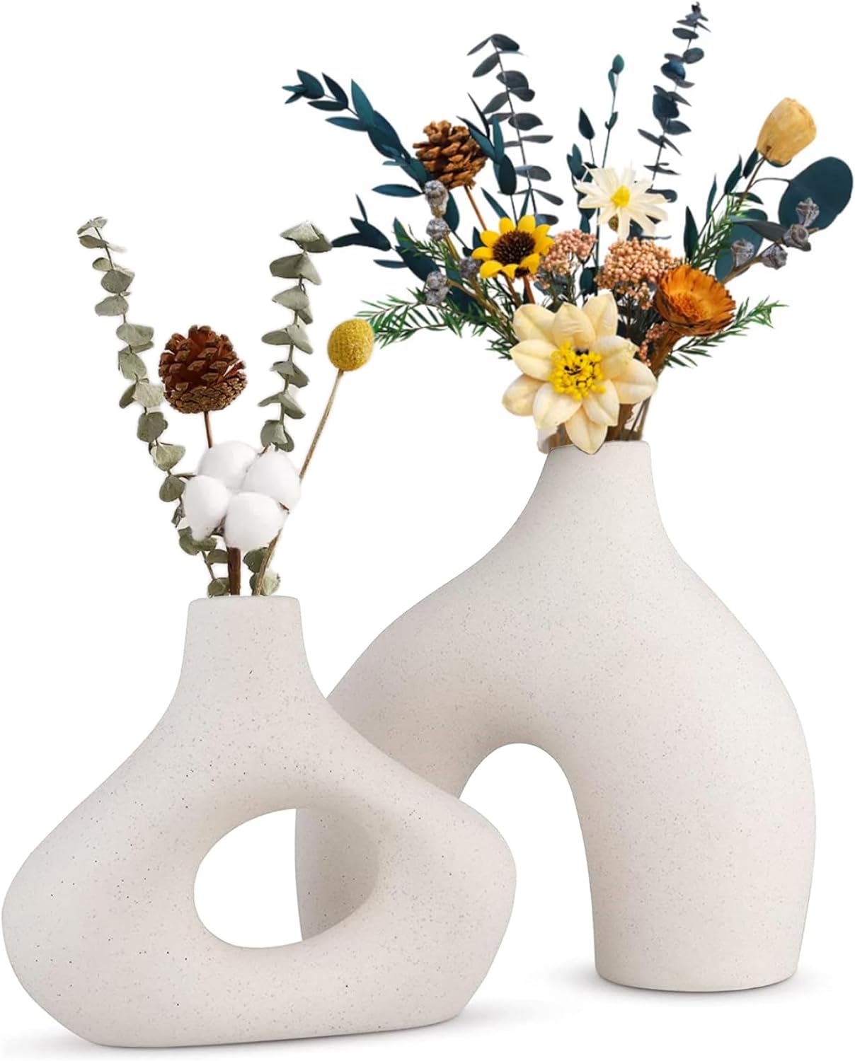 Modern white ceramic vase set with floral arrangements, perfect for home decor and stylish accents in any room.