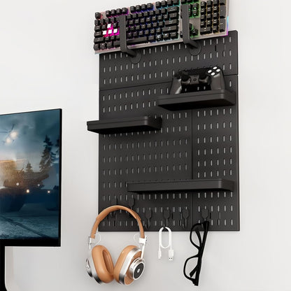 Pegboard organiser displaying gaming keyboard, controller, headphones, and accessories for efficient wall storage in black.