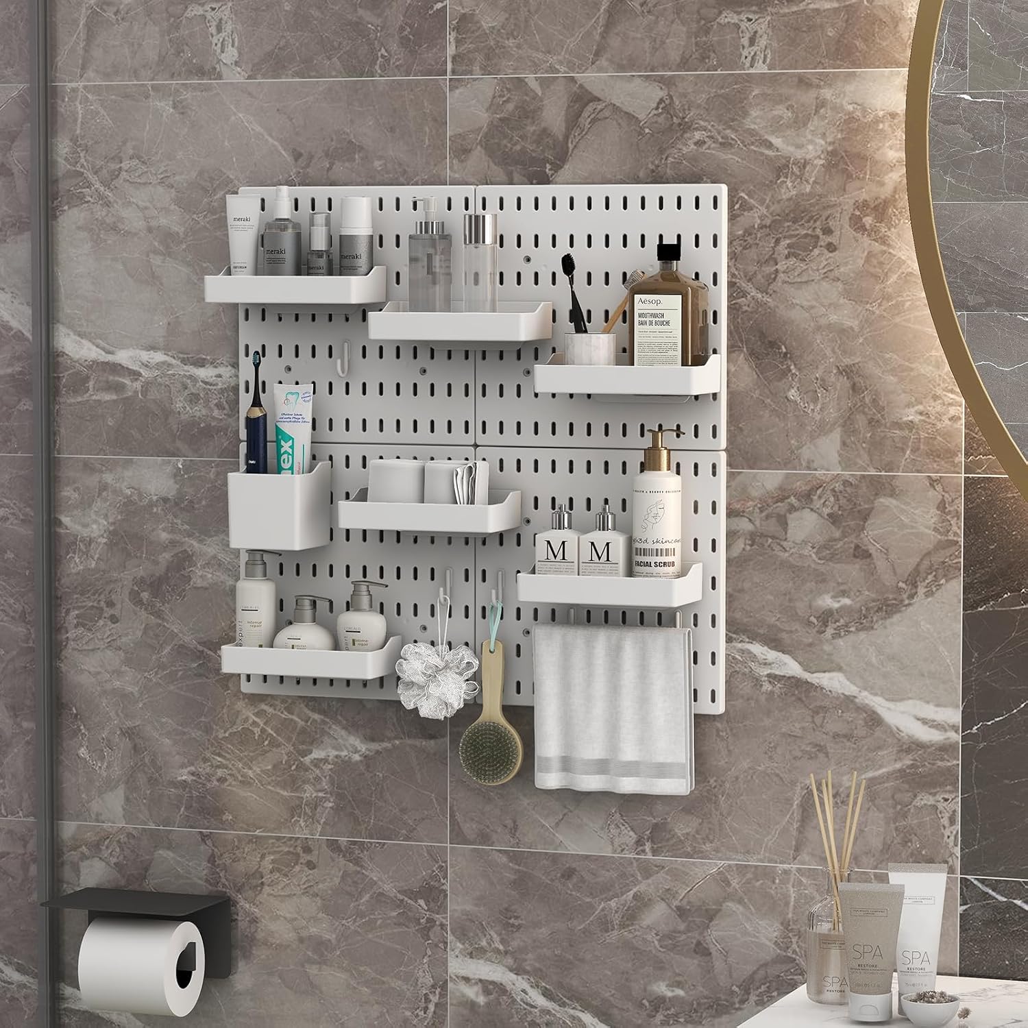 White pegboard wall organiser with shelves and accessories for bathroom storage and customisation.