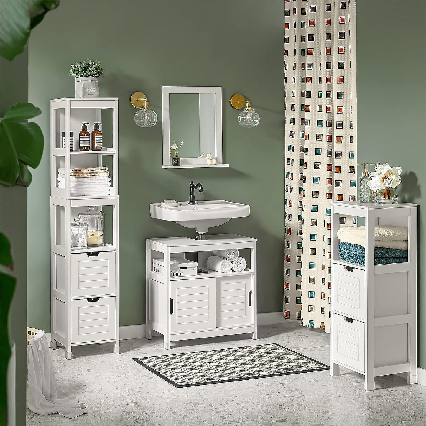 Stylish freestanding cabinet set for storage, featuring white finish and organized bathroom essentials.