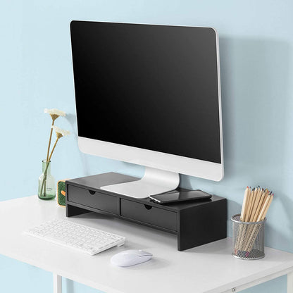 Black monitor stand desk organizer with 2 drawers, elevating computer screen for comfort and neat workspace.