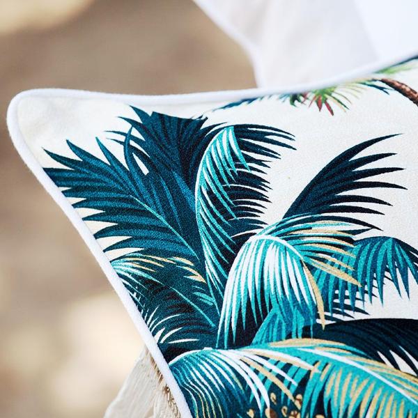 Cushion cover featuring vibrant palm tree design with piping, perfect for indoor and outdoor use.