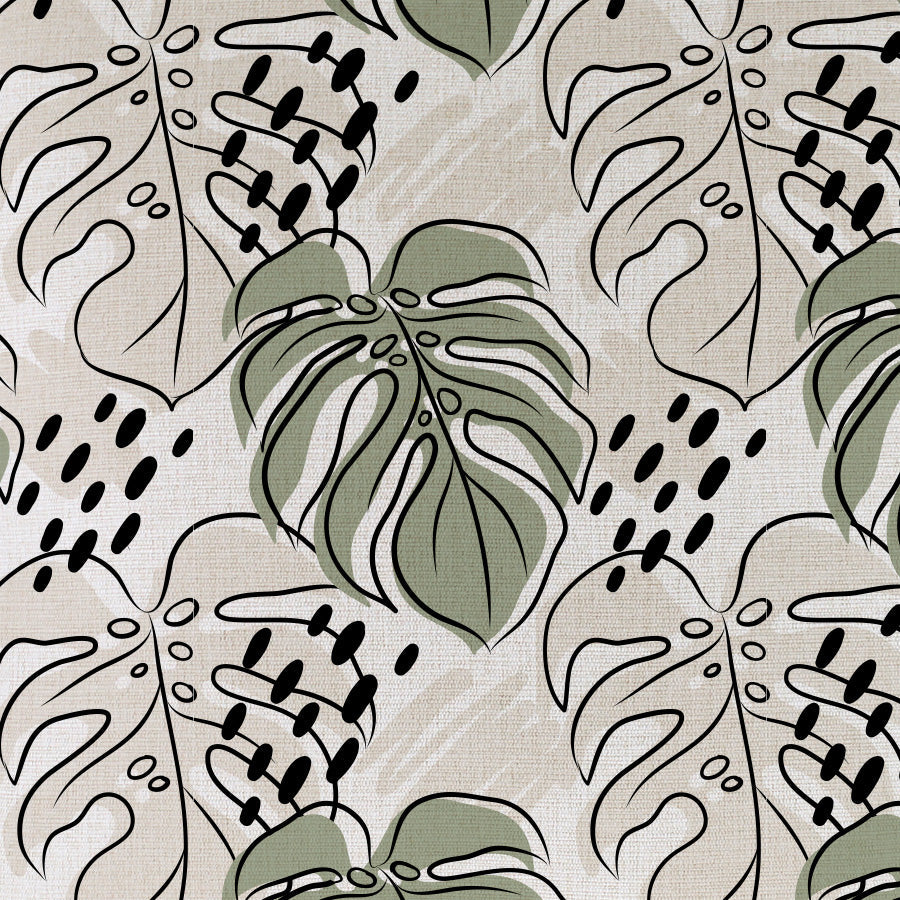 Patterned fabric featuring leafy motifs, perfect for cushion covers and home decor. Ideal for tropical-themed interiors.