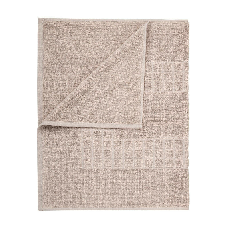 Microfiber soft non-slip taupe bath mat with check design, perfect for any bathroom and comfortable for drying feet.