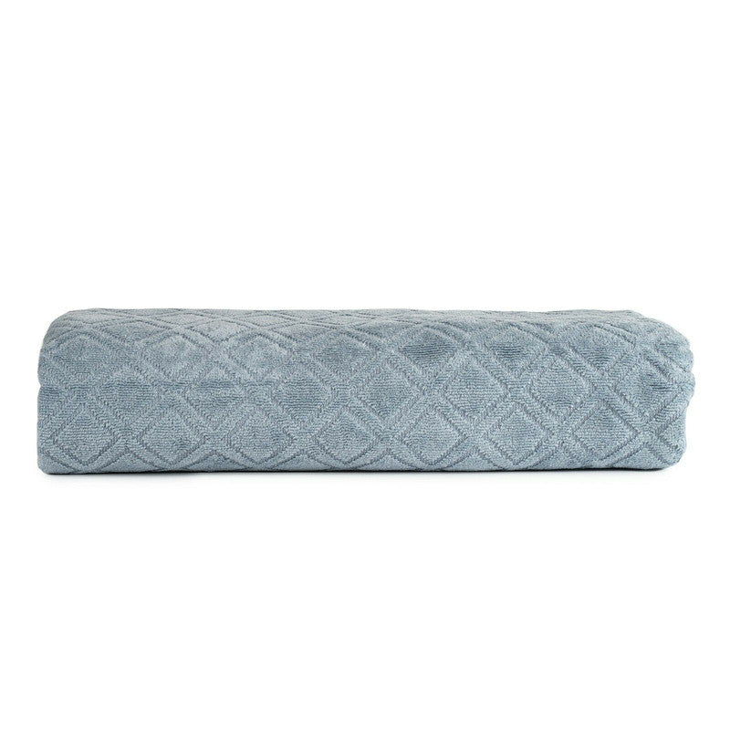 Premium blue velour bath towel with diamond jacquard design, perfect for enhancing any bathroom with luxury and style.