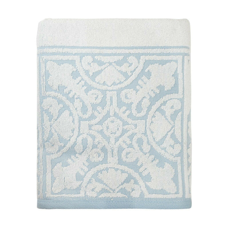 Premium jacquard bath towel in white and blue design, perfect for enhancing your bathroom decor and comfort.