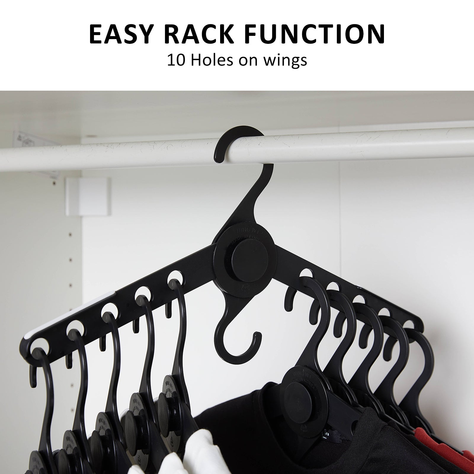 50X Plus Hanger in black showcasing 10 holes, perfect for maximizing closet space and organizing clothes efficiently.