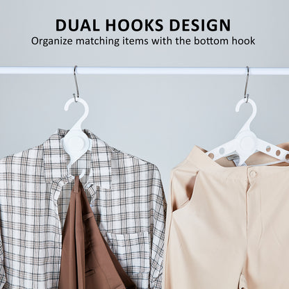 Dual hooks design clothes hanger organizing matching items, featuring a shirt and pants for efficient storage and accessibility.