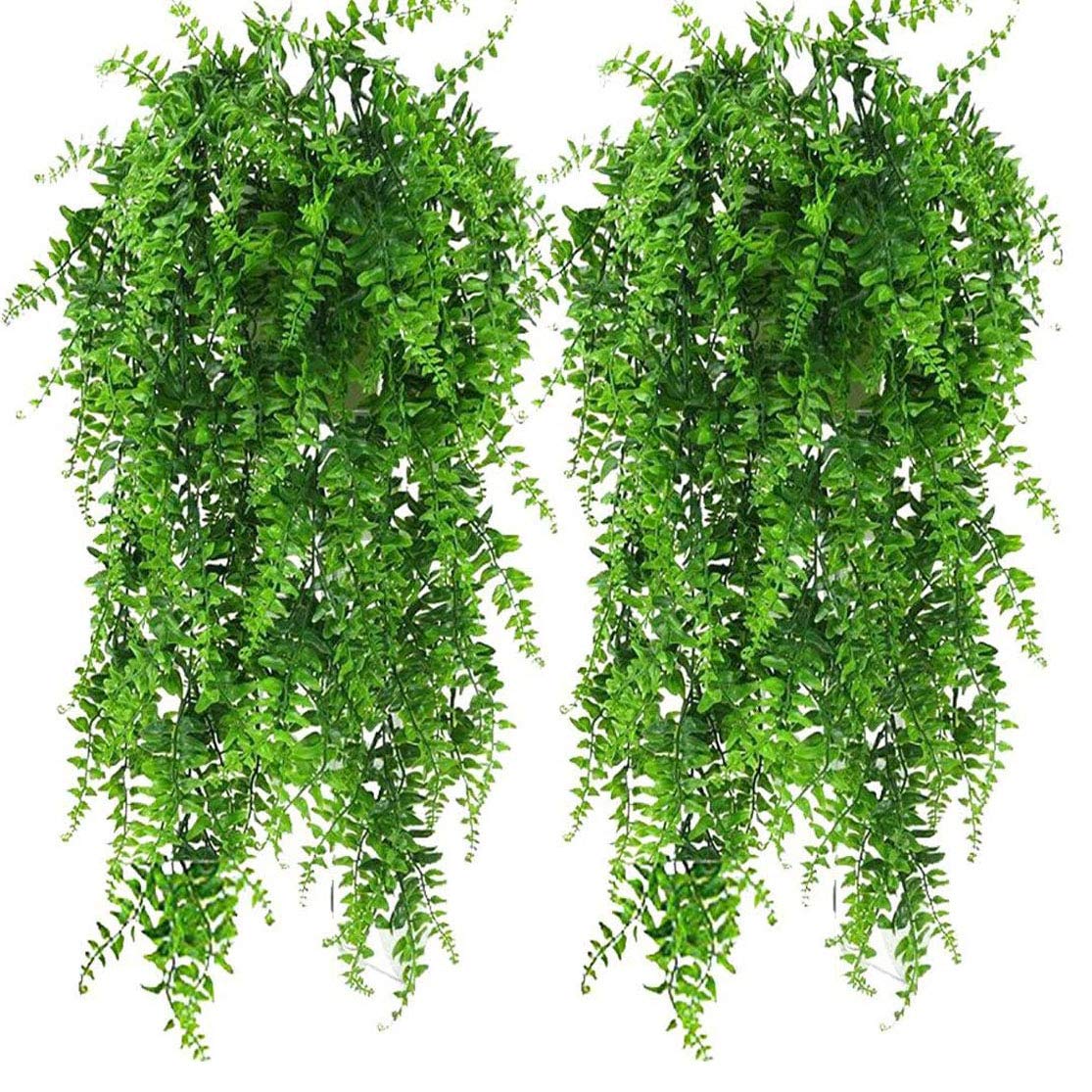 2 pack of vibrant artificial eucalyptus plants for home, office, or wedding decoration, featuring lush green leaves.