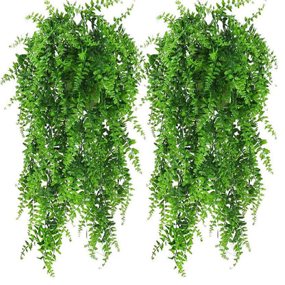 2 pack of vibrant artificial eucalyptus plants for home, office, or wedding decoration, featuring lush green leaves.