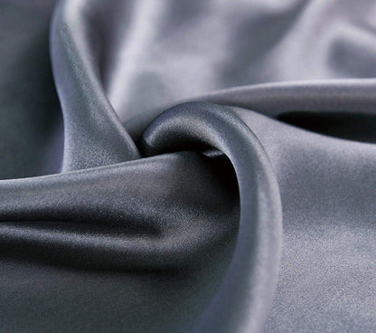 Luxurious charcoal mulberry silk fabric showcasing its smooth texture and sheen for premium pillowcases.