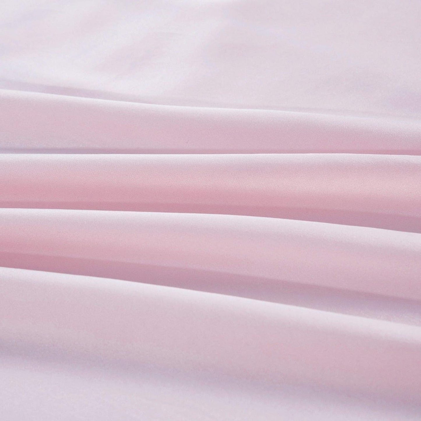 Luxurious pink mulberry silk pillowcase fabric showcasing smooth texture and elegance for ultimate comfort.