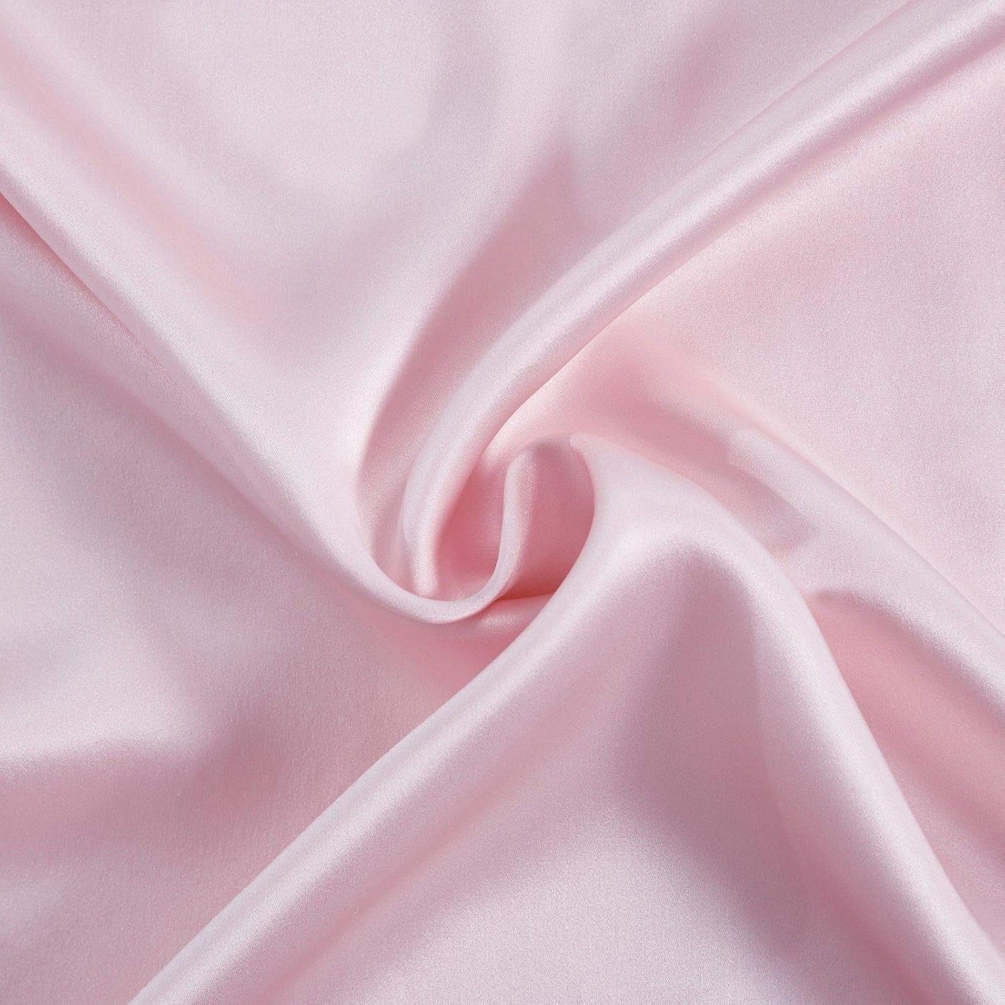 close-up of luxurious pink mulberry silk fabric, perfect for silk pillowcases, offering luxury and comfort.