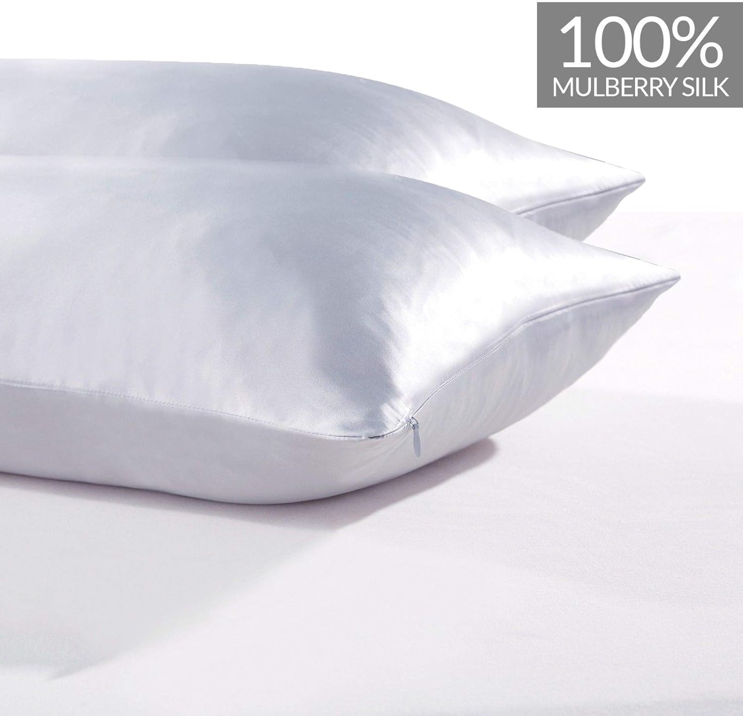 Luxury silver pillowcases made from 100% pure Mulberry silk for a smooth, comfortable sleep experience.