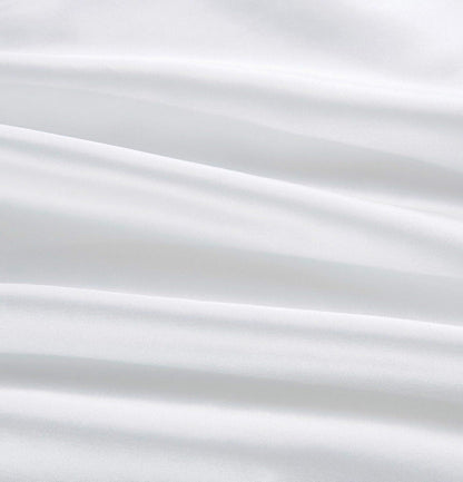 Luxurious white silk fabric showcasing the smooth texture of 100% pure Mulberry silk pillowcases.