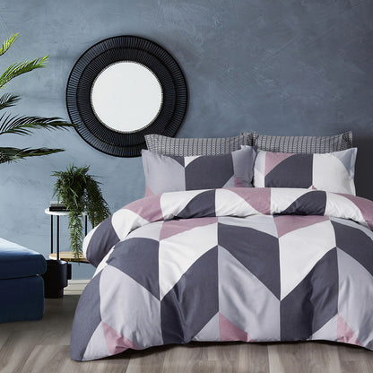 Stylish reversible quilt cover set in geometric design, featuring 100% cotton, perfect for a modern queen-size bed.