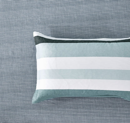 Striped standard pillowcase on a textured quilt cover, showcasing a cotton duvet cover set design.