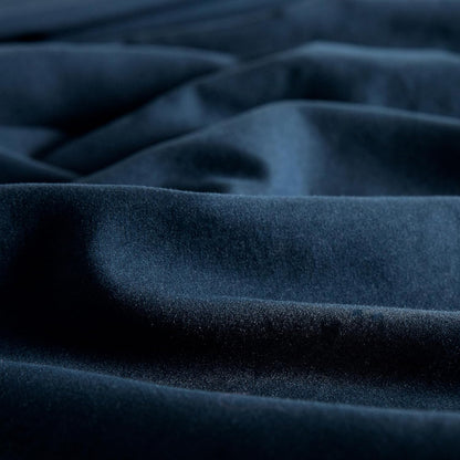 close-up of luxurious navy vintage washed microfibre fabric, showcasing softness and smooth texture for pillowcases.