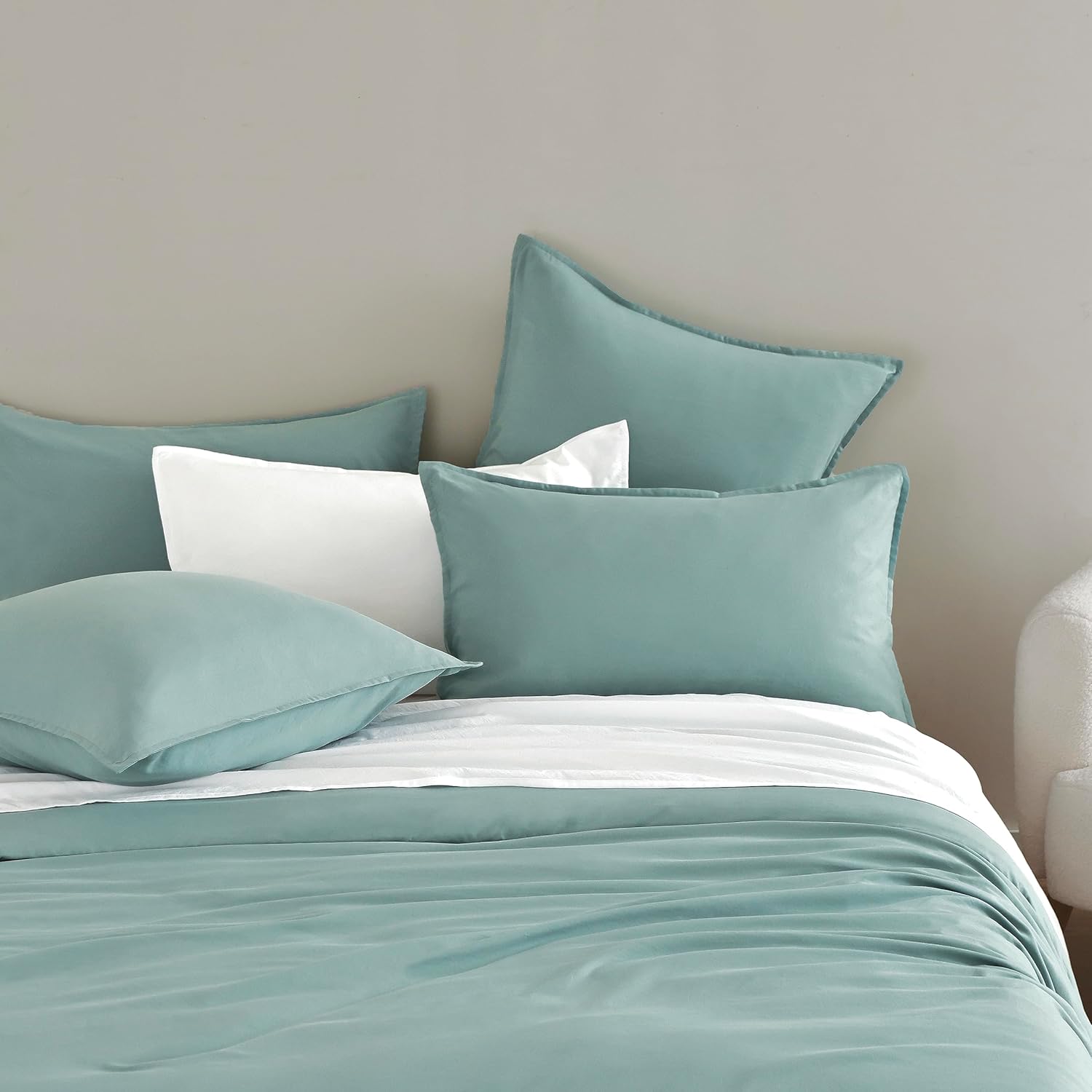 Vintage washed microfibre European pillowcases in seafoam, set of 2 luxurious pillow covers on a neatly made bed.