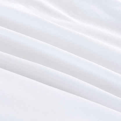 Luxurious white microfibre fabric of vintage washed European pillowcases, showcasing smooth and soft texture.