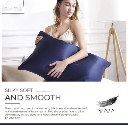 Woman relaxing with a navy luxury mulberry silk pillowcase, highlighting its softness and skin-friendly benefits.