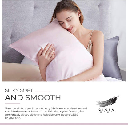 Young woman hugging a pink luxury Mulberry silk pillowcase, showcasing its silky softness and smooth texture for restful sleep.