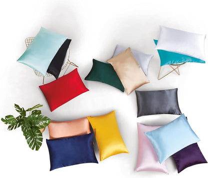 Assorted luxury pillowcases in various colors and textures, showcasing the elegance of silk materials for a stylish bedroom decor.