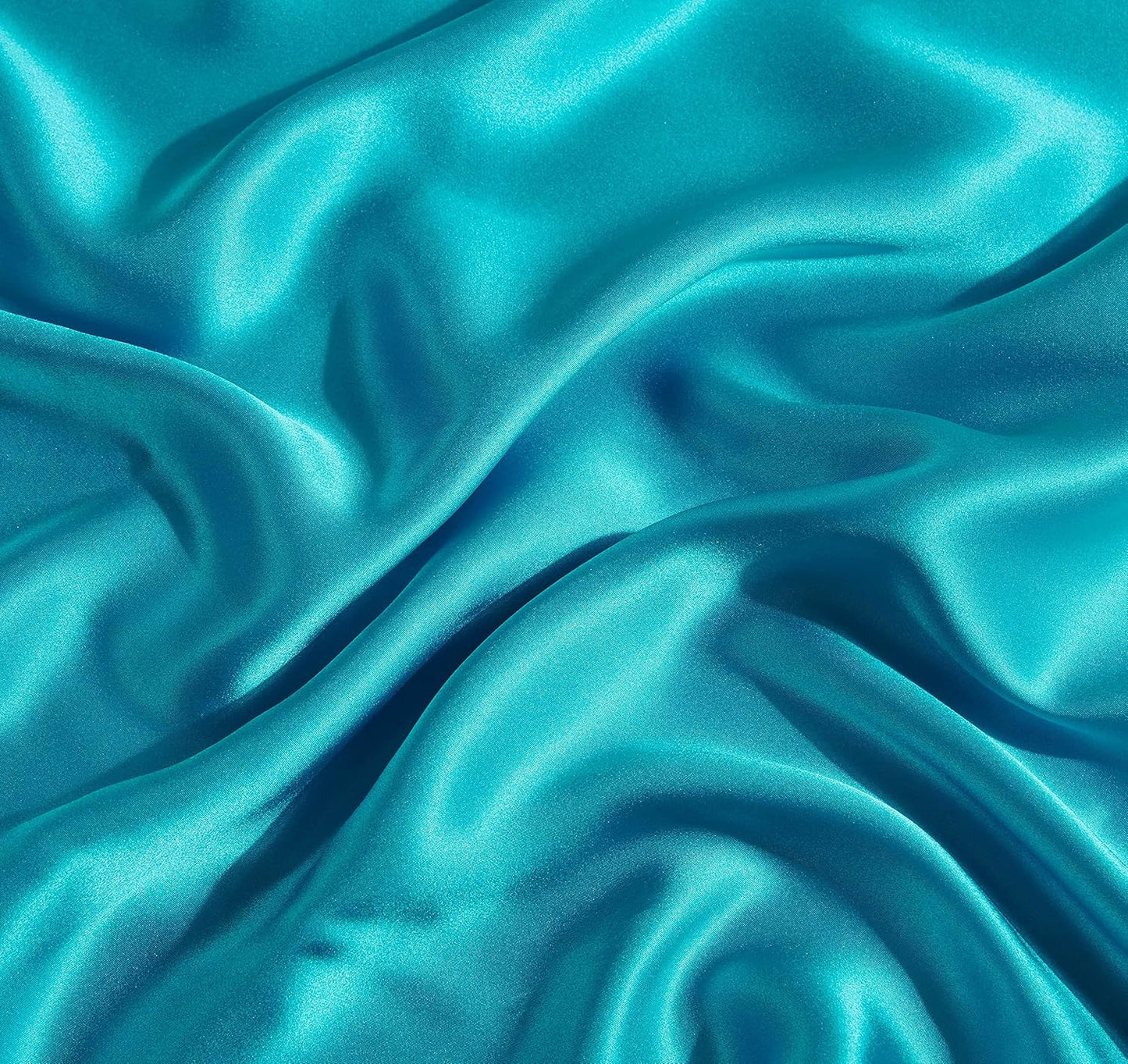 Luxurious teal fabric of 100% pure Mulberry silk, showcasing a smooth, shiny texture ideal for high-end pillowcases.