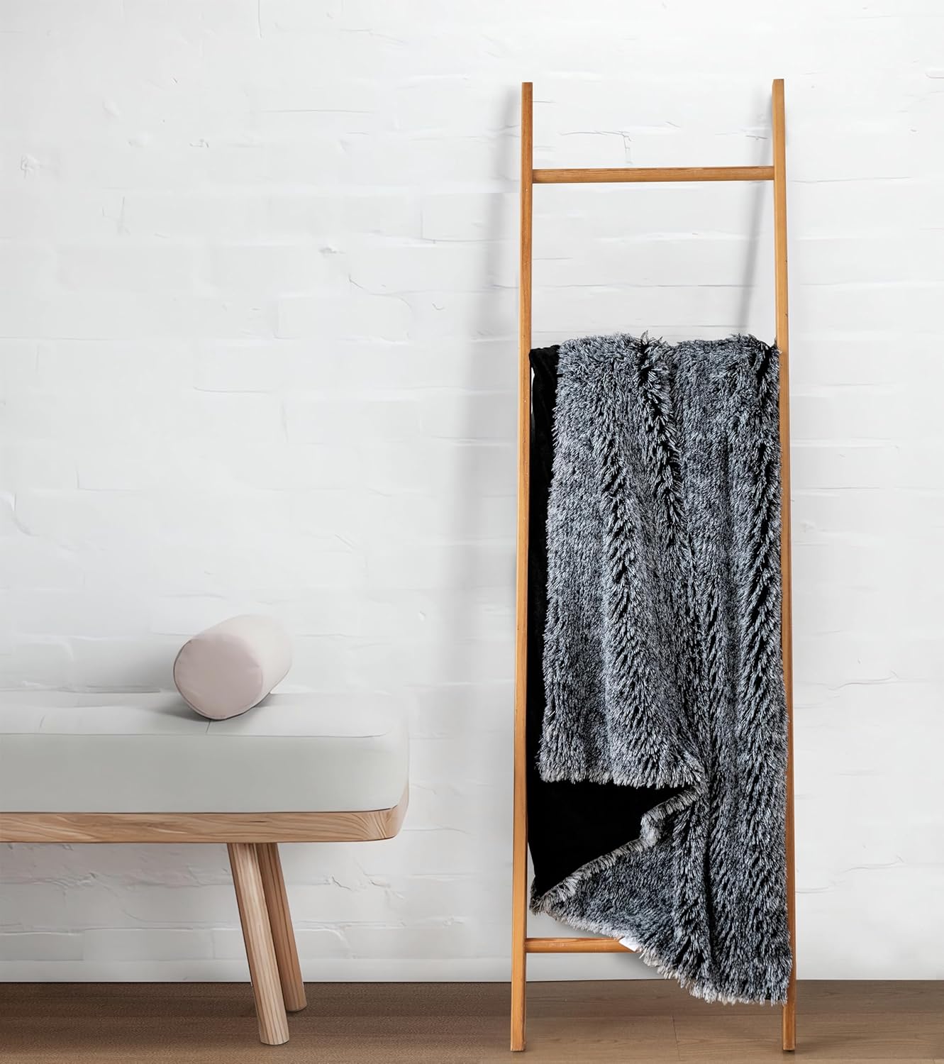 Charcoal faux fur shaggy throw blanket on wooden ladder, home decor cozy throw blanket.