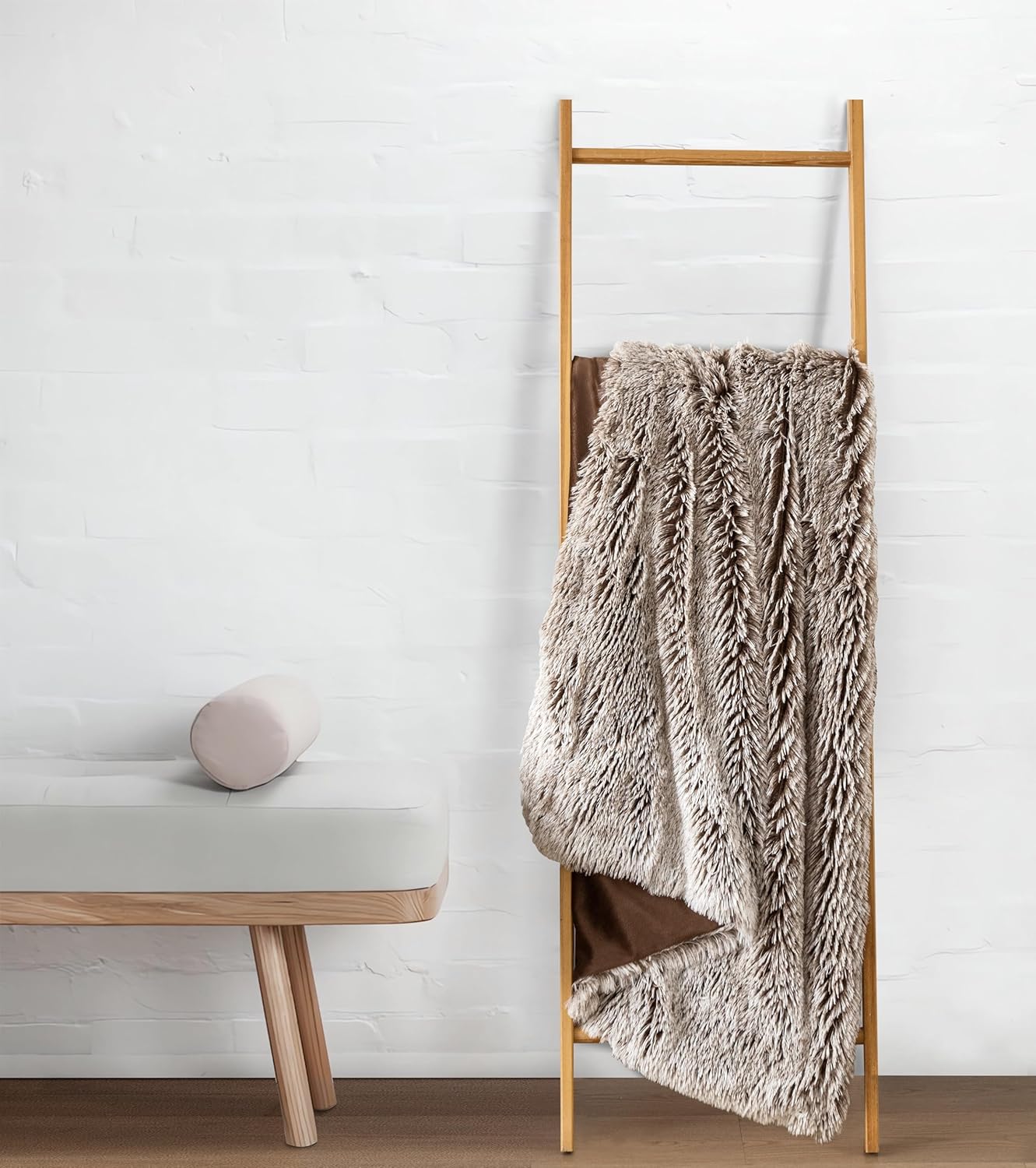 Premium chestnut double-sided faux fur shaggy throw blanket hanging on a ladder, showcasing plush texture and reversible design.