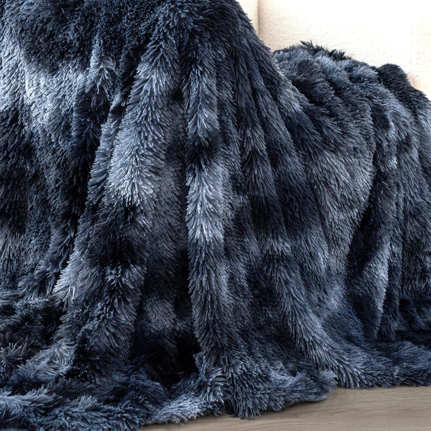 Navy faux fur shaggy throw blanket with plush textures, reversible design, perfect for cozy home retreats.