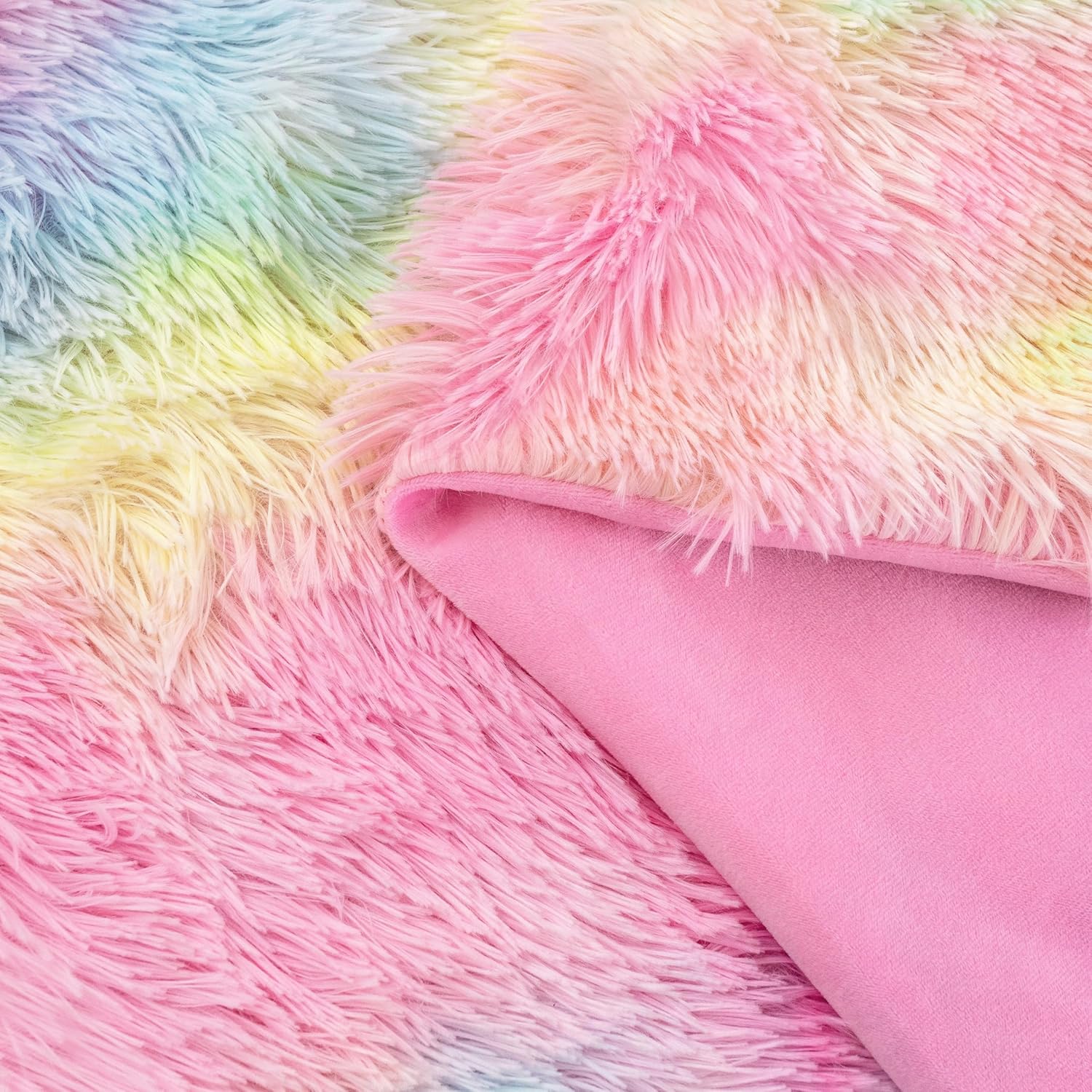 Rainbow faux fur shaggy throw blanket with reversible microfibre, perfect for cozy comfort. Discover luxury throws and blankets.