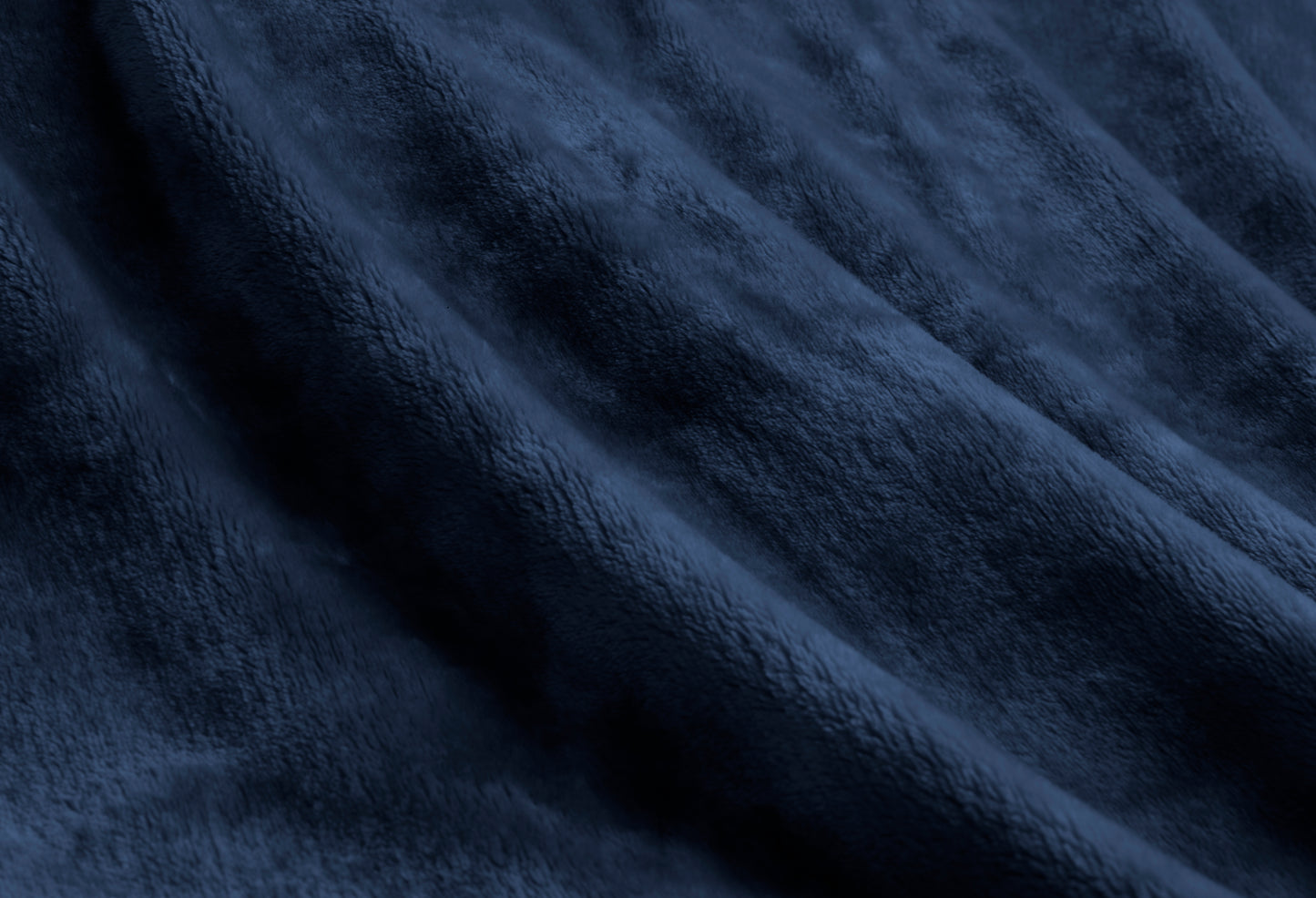 Soft navy blue plush velvet blanket, showcasing its luxurious texture and warmth, perfect as a cozy throw blanket.