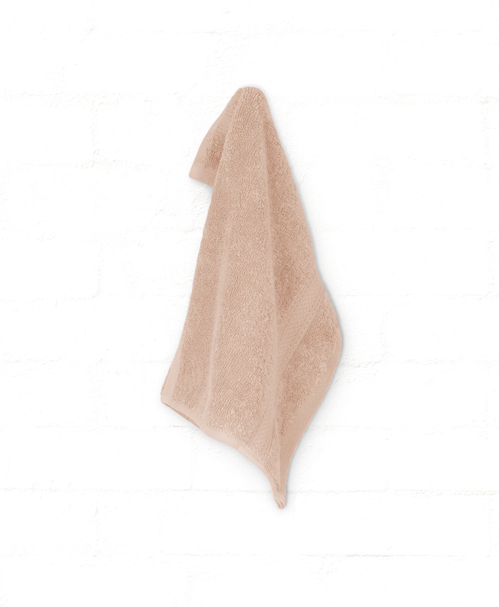 Peach St. Regis luxury cotton bath towel from 5-piece set, highly absorbent and soft, ideal for stylish bathrooms.